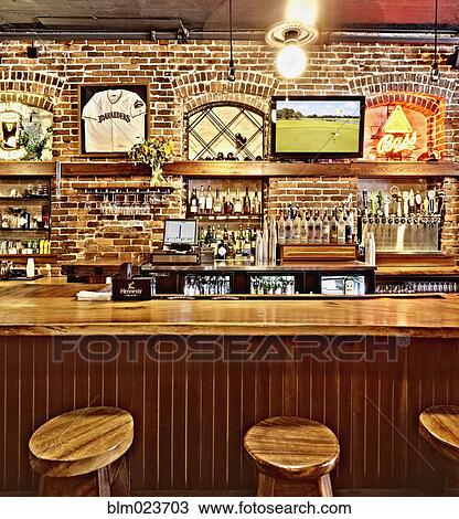 Stools and Counter in a Sports Bar View Large Photo Image Stock Image - Stools and Counter in a Sports Bar. Fotosearch