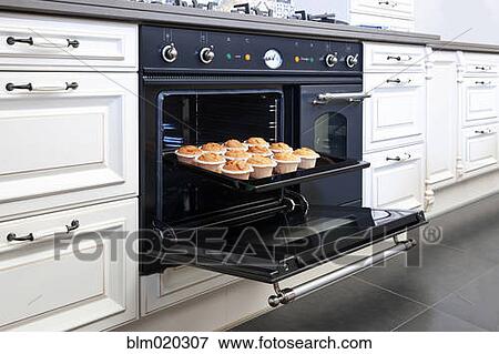 Stylish oven in a modern kitchen View Large Photo Image Stock Photo - Stylish oven in a modern kitchen. Fotosearch