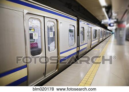 Subway train and platform, Tokyo, Japan View Large Photo Image Stock Photo - Subway train and platform, Tokyo, Japan. Fotosearch