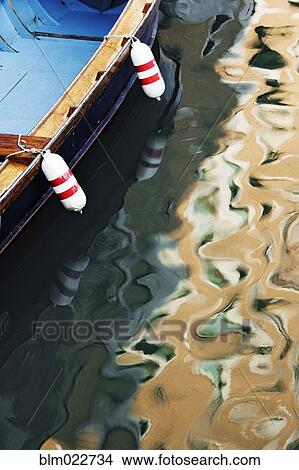 Sunlight and Boat Reflected in Canal View Large Photo Image Picture - Sunlight and Boat Reflected in Canal. Fotosearch
