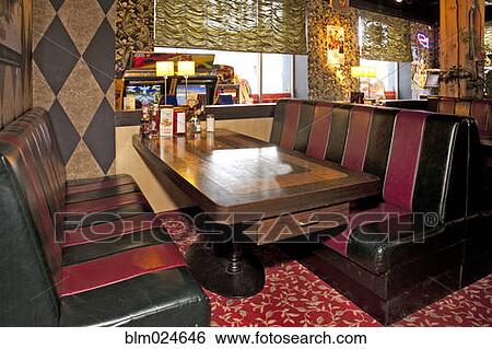Stock Photograph - Table and Booths at an Americana Diner. Fotosearch
