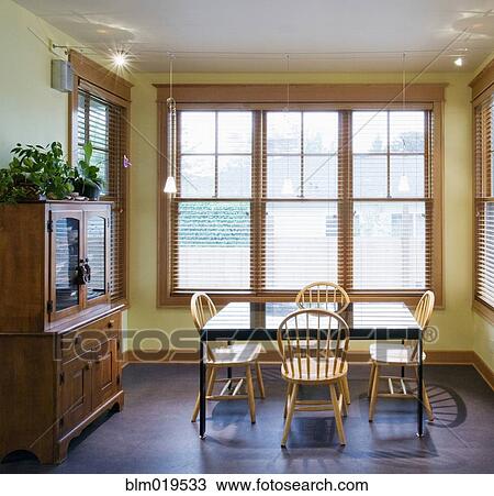 Stock Image - Table and Hutch in Dining room. Fotosearch