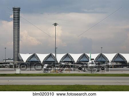 Terminal, control tower and airplane at Bangkok Airport View Large Photo Image Stock Image - Terminal, control tower and airplane at Bangkok Airport. Fotosearch