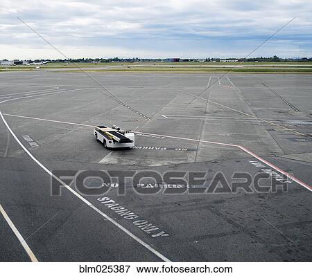 The airport apron, tarmac, marked out areas, for service vehicles View Large Photo Image Stock Photo - The airport apron, tarmac, marked out areas, for service vehicles. Fotosearch