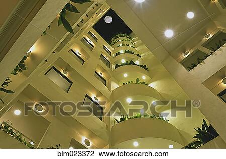 Stock Image - The courtyard of the Lucia Hotel. Fotosearch