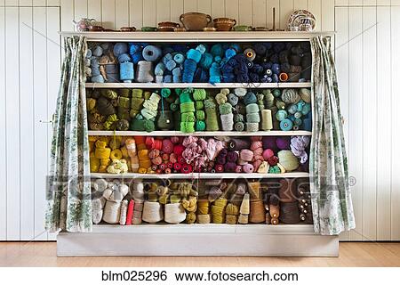 Stock Photograph - Threads arranged in color order. Fotosearch