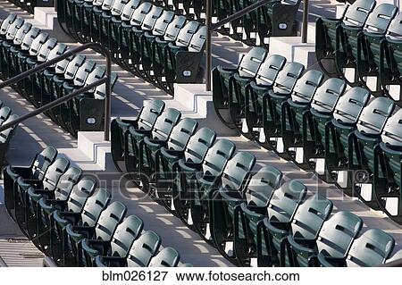 Tiers of seating around a sports field or track View Large Photo Image Stock Photo - Tiers of seating around a sports field or track. Fotosearch