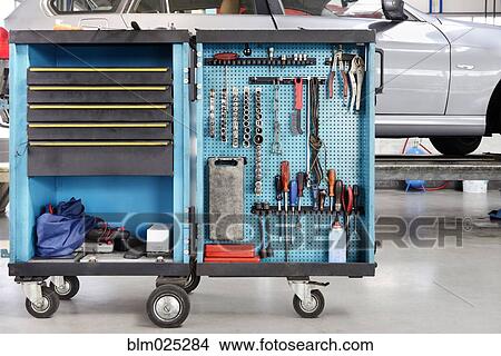 Tool cart in a car repair workshop or garage View Large Photo Image Picture - Tool cart in a car repair workshop or garage. Fotosearch