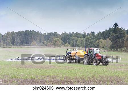 Tractor Spraying Herbicide View Large Photo Image Stock Image - Tractor Spraying Herbicide. Fotosearch