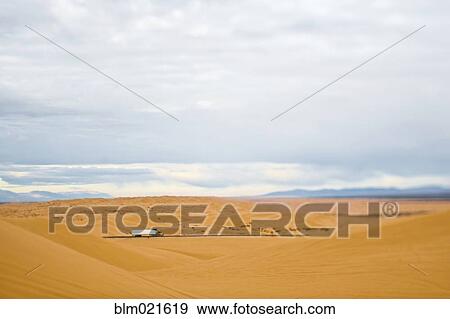 Truck Driving Through Desert View Large Photo Image Stock Photo - Truck Driving Through Desert. Fotosearch