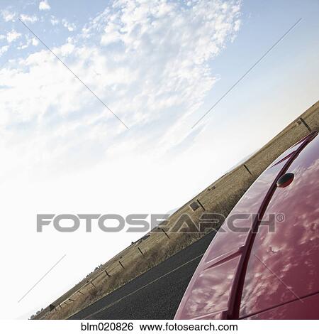 Trunk of Red Car Reflecting Clouds View Large Photo Image Stock Photograph - Trunk of Red Car Reflecting Clouds. Fotosearch