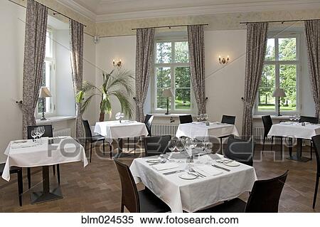 Stock Photography - Upscale Hotel Dining Room. Fotosearch