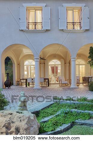 Stock Photography - Upscale Residence Seen From Backyard. Fotosearch