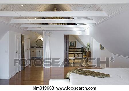 Stock Image - Vaulted Ceiling Bedroom. Fotosearch
