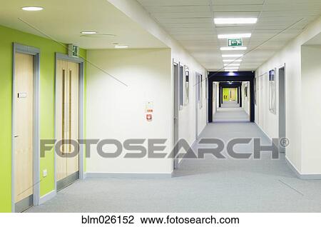 View along a bright corridor in a modern secondary school View Large Photo Image Stock Image - View along a bright corridor in a modern secondary school. Fotosearch