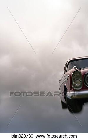 Stock Image - Vintage Car In The Sky. Fotosearch
