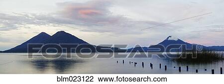 Stock Image - Volcanoes in the Distance. Fotosearch