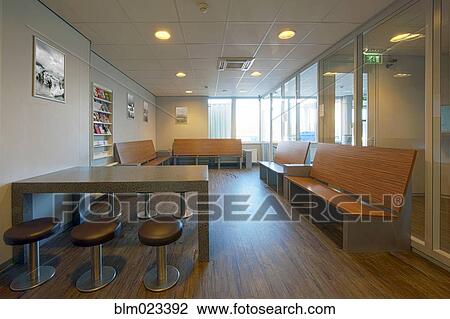 Stock Image - Waiting room in an emergency or drop in medical center. Fotosearch