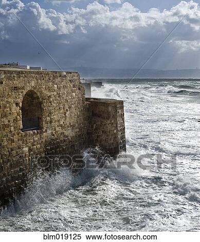Waves Breaking Against Ancient Walls During A Storm View Large Photo Image Stock Photography - Waves Breaking Against Ancient Walls During A Storm. Fotosearch