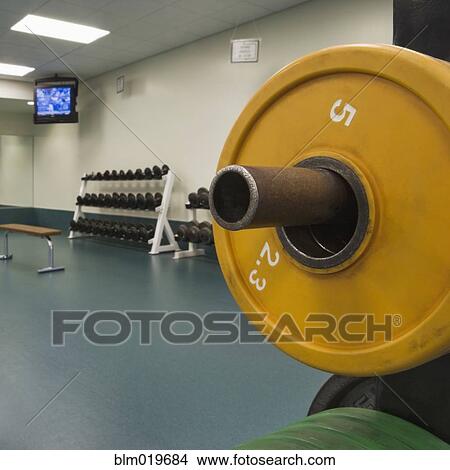 Weights in a Weight Room View Large Photo Image Picture - Weights in a Weight Room. Fotosearch