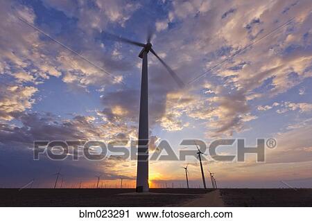Stock Image - Wind Farm at Sunset. Fotosearch
