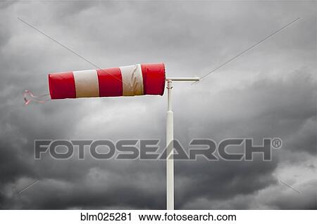 Stock Image - Wind Vane in stormy weather. Fotosearch