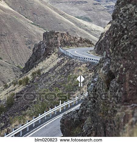 Stock Image - Winding Mountain Road. Fotosearch