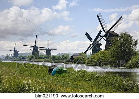 Windmills in Dutch Countryside View Large Photo Image Stock Image - Windmills in Dutch Countryside. Fotosearch