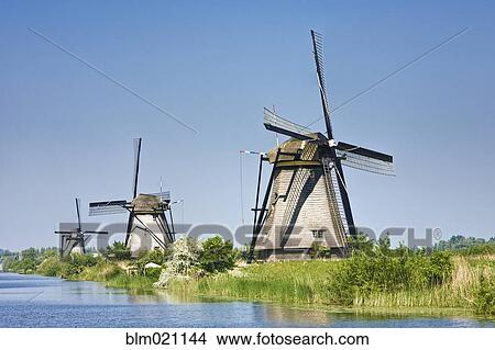 Picture - Windmills, Kinderdijk, The Netherlands, Europe. Fotosearch