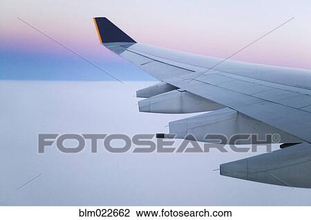 Wing and Engines of Jet in Flight View Large Photo Image Stock Image - Wing and Engines of Jet in Flight. Fotosearch