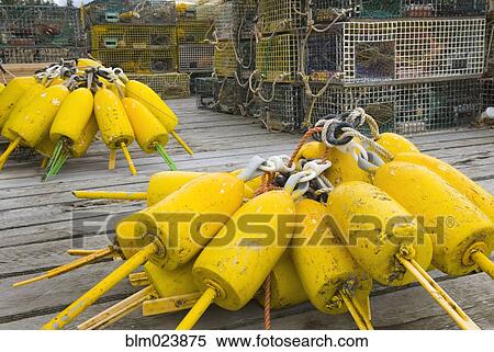 Yellow lobster buoys View Large Photo Image Stock Photography - Yellow lobster buoys . Fotosearch