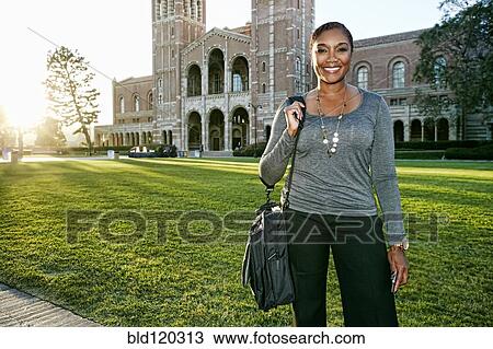 African American professor smiling on campus View Large Photo Image Stock Image - African American professor smiling on campus. Fotosearch