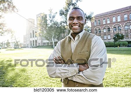 African American professor smiling on campus View Large Photo Image Stock Photography - African American professor smiling on campus. Fotosearch