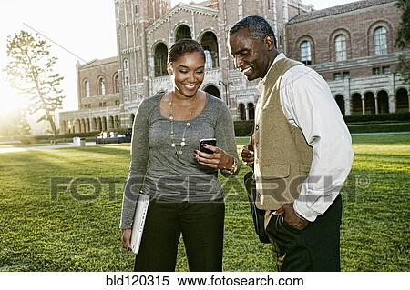 African American professors talking on campus View Large Photo Image Stock Photography - African American professors talking on campus. Fotosearch