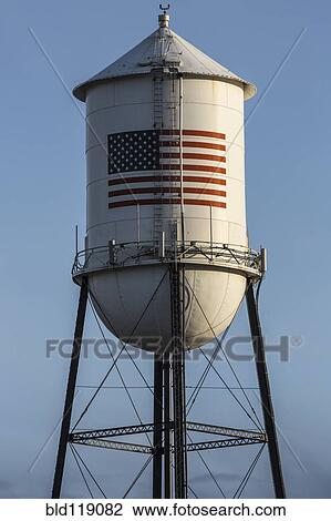 American flag on water tower View Large Photo Image Stock Image - American flag on water tower. Fotosearch