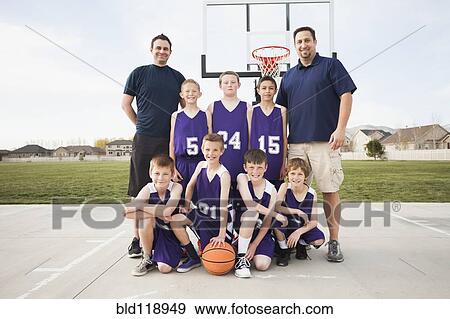Caucasian basketball team smiling court View Large Photo Image Stock Photo - Caucasian basketball team smiling court. Fotosearch