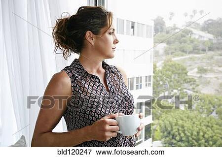 Caucasian businesswoman having cup of coffee View Large Photo Image Stock Photo - Caucasian businesswoman having cup of coffee. Fotosearch