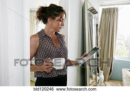 Caucasian businesswoman using digital tablet View Large Photo Image Stock Photograph - Caucasian businesswoman using digital tablet. Fotosearch