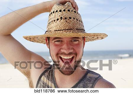 Caucasian man smiling on beach View Large Photo Image Stock Photograph - Caucasian man smiling on beach. Fotosearch