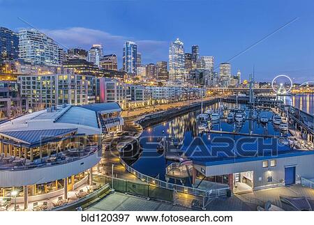 Stock Photo - City skyline lit up at night, Seattle, Washington, United States. Fotosearch