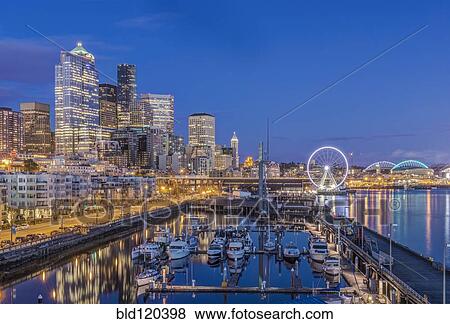 City skyline lit up at night, Seattle, Washington, United States View Large Photo Image Stock Photo - City skyline lit up at night, Seattle, Washington, United States. Fotosearch