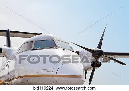 Close up of airplane on runway View Large Photo Image Picture - Close up of airplane on runway. Fotosearch