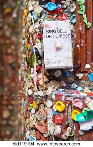 Close up of bell button on wall covered with used gum View Large Photo Image Picture - Close up of bell button on wall covered with used gum. Fotosearch