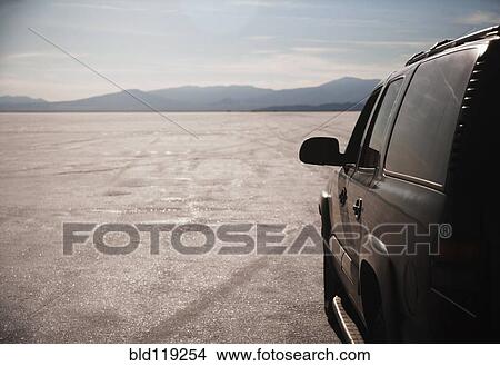 Close up of car driving on salt flats, Bonnaville Salt Flats, Utah, United States View Large Photo Image Picture - Close up of car driving on salt flats, Bonnaville Salt Flats, Utah, United States. Fotosearch