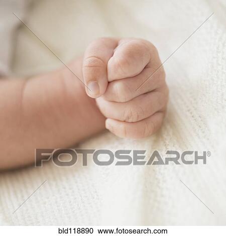 Close up of Hispanic infant's fist View Large Photo Image Stock Image - Close up of Hispanic infant's fist. Fotosearch