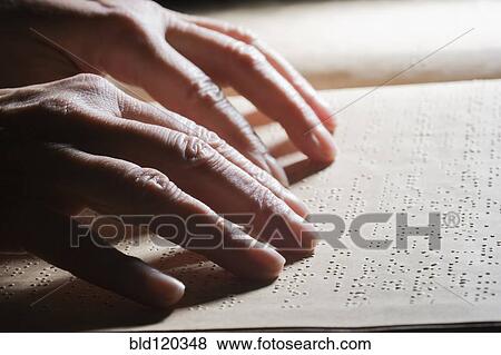Close up of Hispanic person reading Braille View Large Photo Image Stock Photo - Close up of Hispanic person reading Braille. Fotosearch