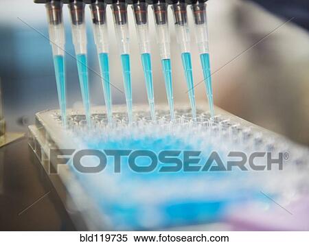 Stock Photography - Close up of pipettes and test tubes. Fotosearch