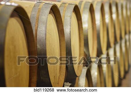 Close up of wine barrels in cellar View Large Photo Image Stock Photo - Close up of wine barrels in cellar. Fotosearch