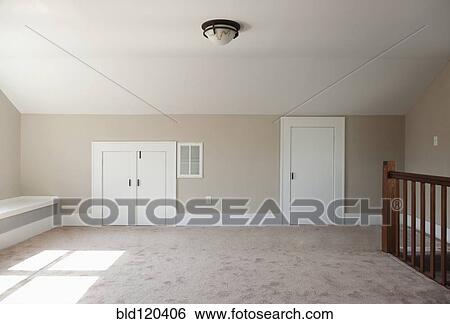 Closets in empty attic room View Large Photo Image Stock Photograph - Closets in empty attic room. Fotosearch