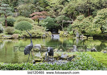 Stock Photography - Crane statues at pond in Japanese Garden, Portland, Oregon, United States. Fotosearch